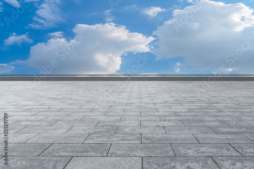 Empty square tiles and beautiful sky scenery