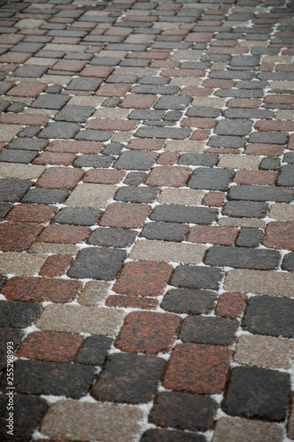 Old cobblestone pavement closeup