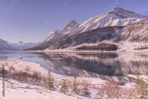Reflections of the Mountains on Spray Lake in Winter