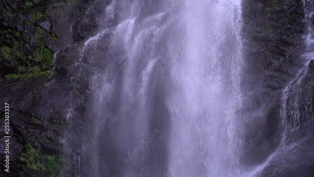 Waterfall in mountains in slow motion. Shot of a natural waterfall near Batumi, Georgia, close up Waterfall in mountains in slow motion. Shot of a natural waterfall near Batumi, Georgia, close up