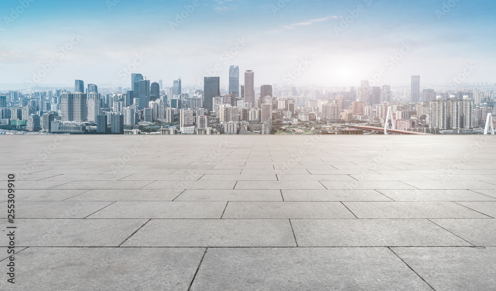 Urban skyscrapers with empty square floor tiles