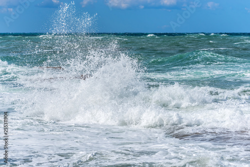 Waves Crashing on Rocks on the Southern Italian Mediterranean Coast