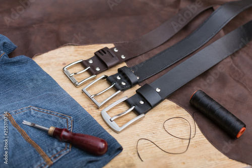 Three hand made leather belt. DIY. Leather thread belt