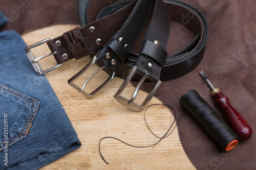 Three hand made leather belt. DIY. Leather thread belt