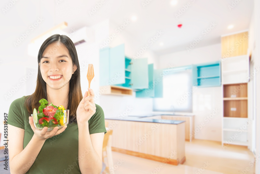 Happy lady holding kichen stuff over copy space background - people home made food preparation concept Happy lady holding kichen stuff over copy space background - people home made food preparation concept