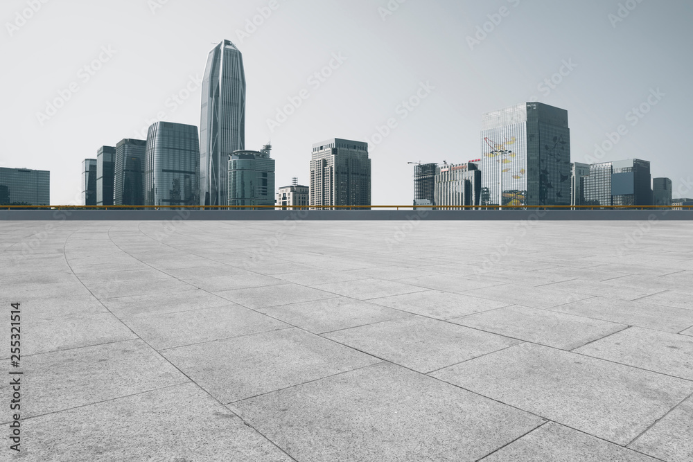 Urban skyscrapers with empty square floor tiles Urban skyscrapers with empty square floor tiles