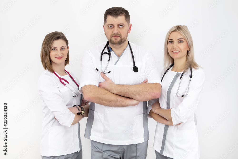 Fototapeta premium three doctors with a stethoscope