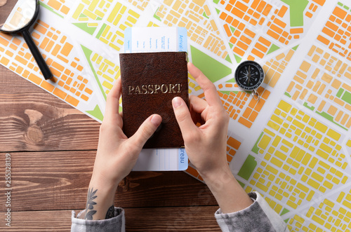 Female hands with passport ...