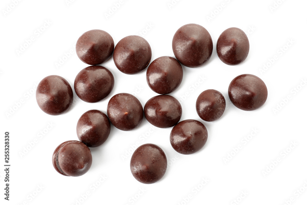 Delicious chocolate chips on white background Delicious chocolate chips on white background
