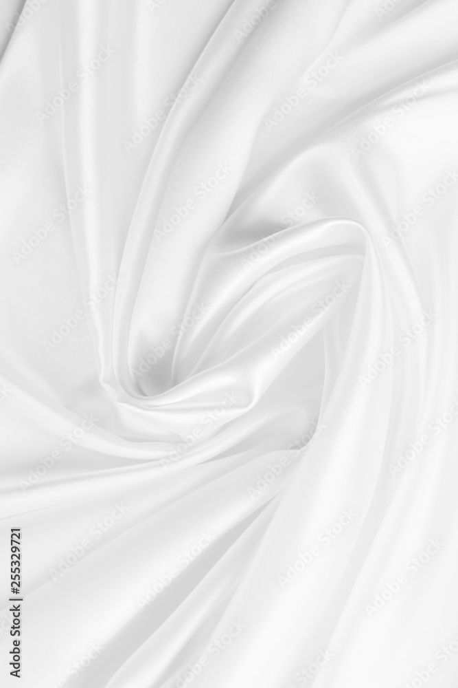 Obraz premium Beautiful smooth elegant wavy white satin silk luxury cloth fabric texture, abstract background design. Copy space. Wedding, engagement concept.