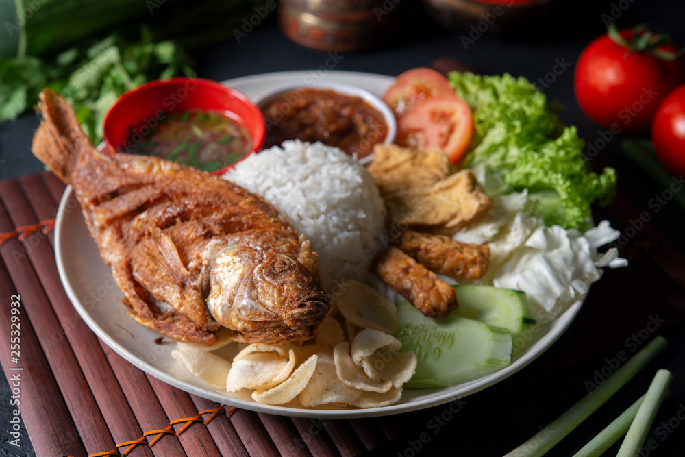 Fried tilapia fish and rice