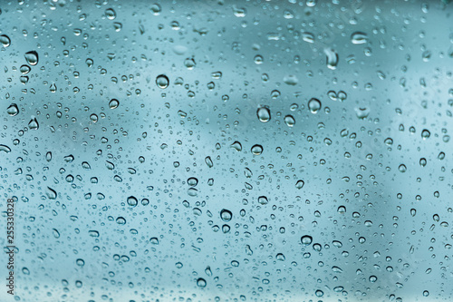 rain drops, water drops on glass in spring. abstract background