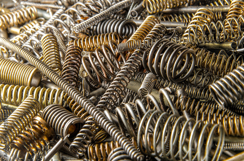 metal coil springs. set of industrial springs. close up