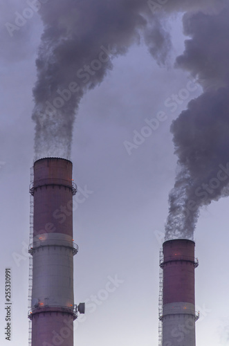 power plant against the sky. thick smoke