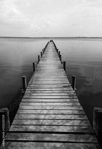 Wooden pier at silence lake, monochrome shoot photo