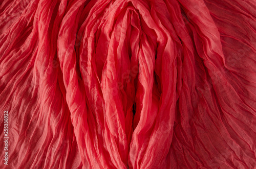 Textile background. Living Coral scarf.