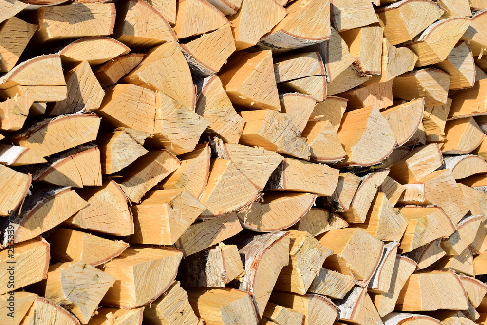 Laying of split birch firewood. Firewood. Fresh and light birch wood. Laying of split birch firewood. Firewood. Fresh and light birch wood.