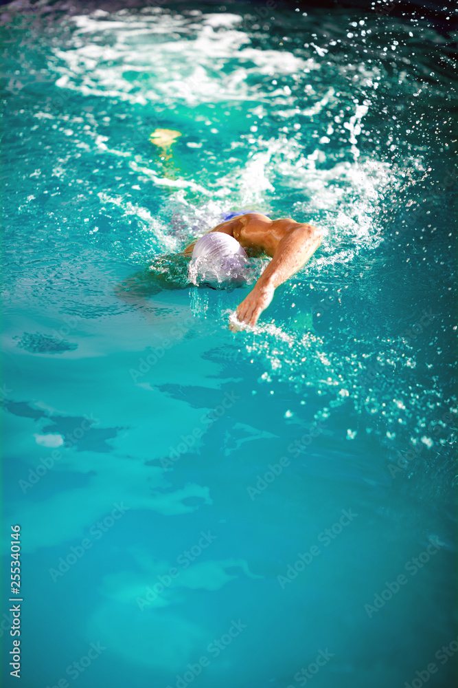 young athlete swimmer recreating on outdoor
