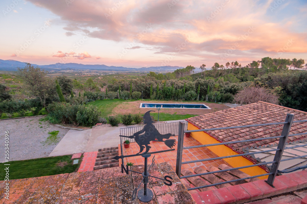 Top view of the pool and landscape. Enjoying the sunset from the terrace of a country house. Top view of the pool and landscape. Enjoying the sunset from the terrace of a country house.