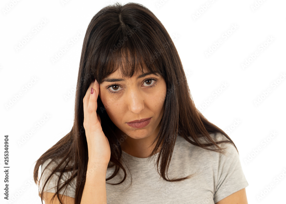Portrait of sad and depressed woman in pain having headache. Human expressions and emotions Portrait of sad and depressed woman in pain having headache. Human expressions and emotions