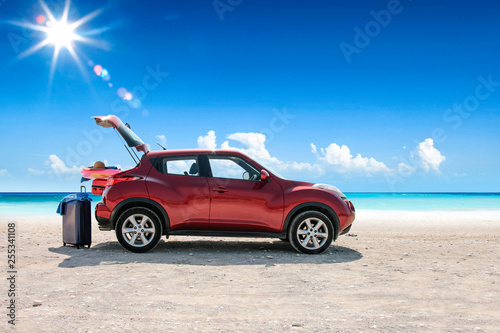 Fototapeta Naklejka Na Ścianę i Meble -  Summer car on beach and sea landscape 