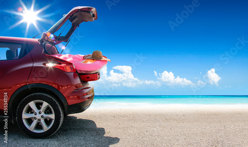 Fototapeta Naklejka Na Ścianę i Meble -  Summer car on beach and sea landscape 