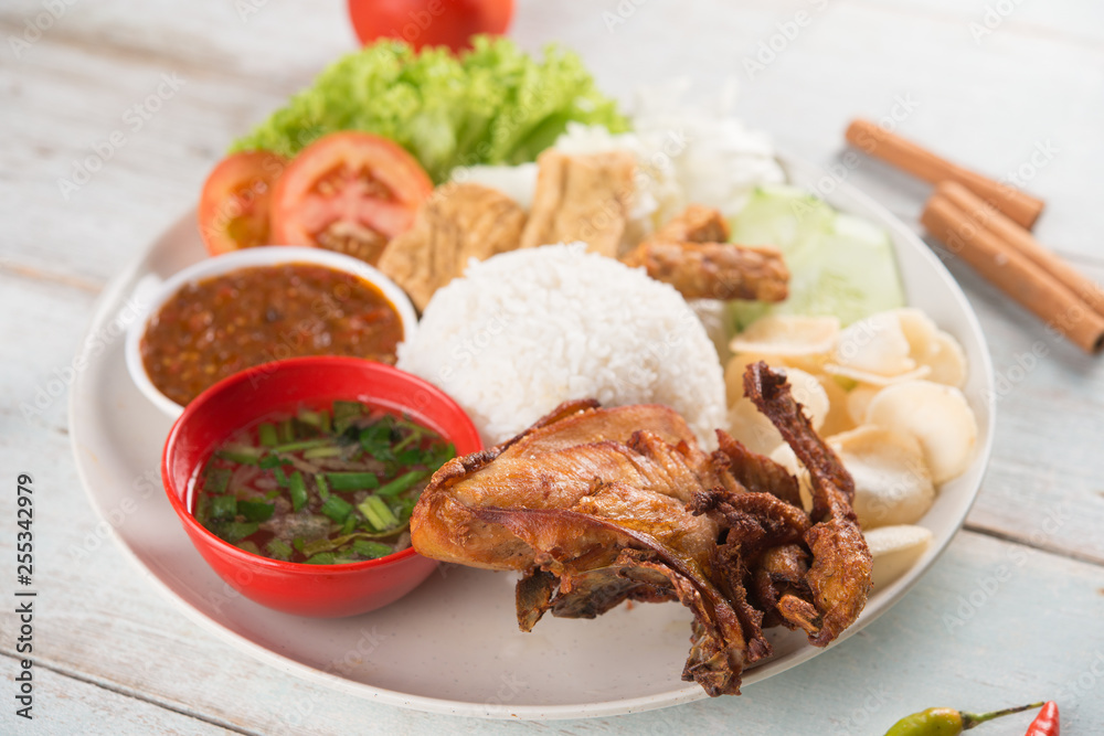 Nasi lemak kukus with fried chicken Nasi lemak kukus with fried chicken