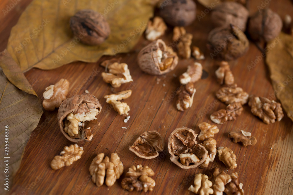Walnuts on wooden background