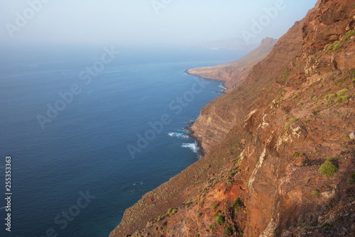 Scenic volcanic coastline landscape, Cliffs in Tamadaba natural park, Grand Canary island, Spain .