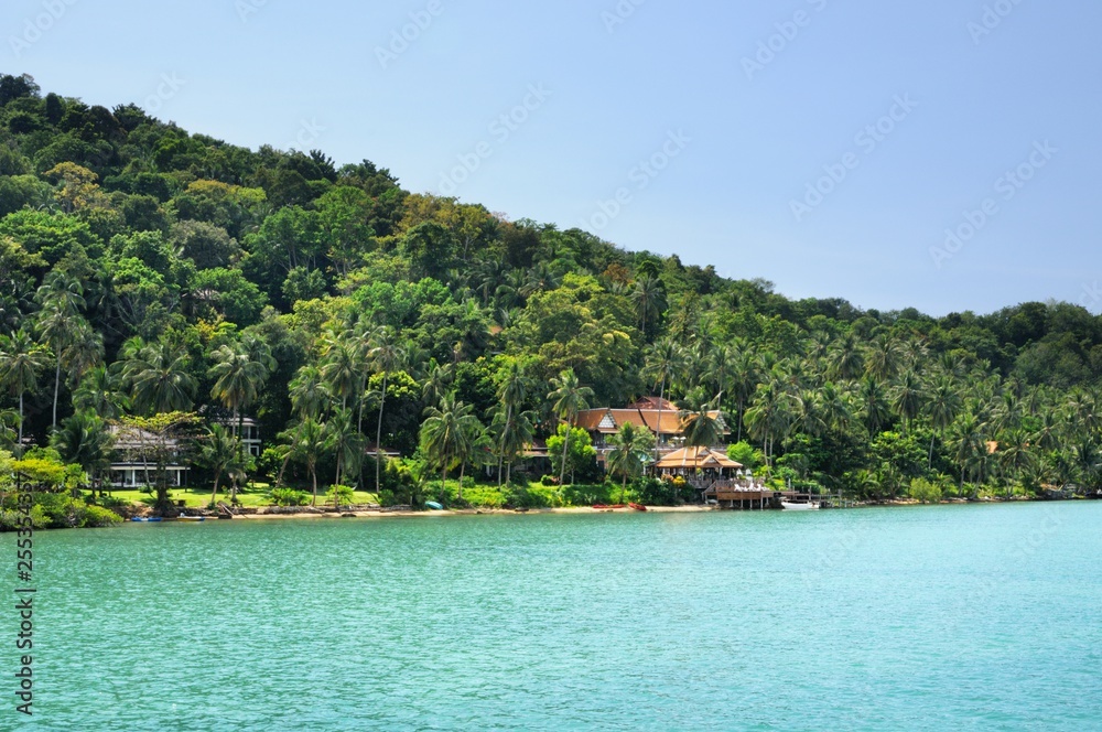 Tropical beach with tourist resorts on Koh Chang island, Thailand.