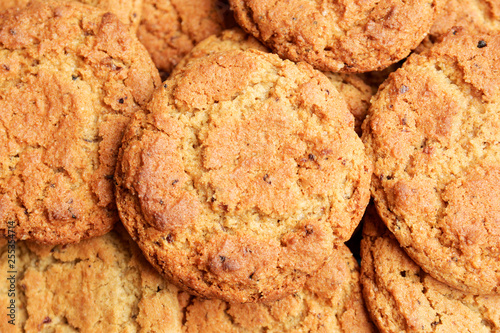 Closeup of a group of assorted cookies. Oatmeal chip. Top view. Biscuit background.