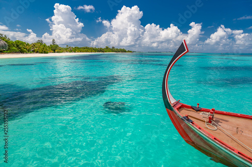 Fototapeta Naklejka Na Ścianę i Meble -  Wonderful scenery, Maldives island beach and sea with Dhoni boat. Exotic travel and vacation background of Maldives. Perfect island beach and sea view, Maldive