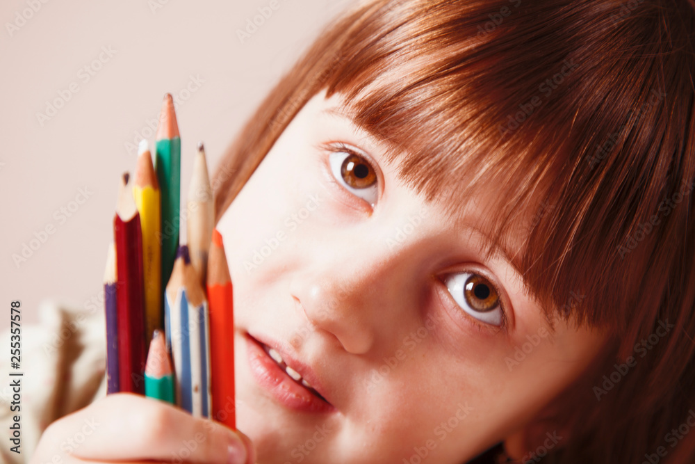 Art, creativity and education concept. Portrait of little cute child girl with colorful pens. Art, creativity and education concept. Portrait of little cute child girl with colorful pens.