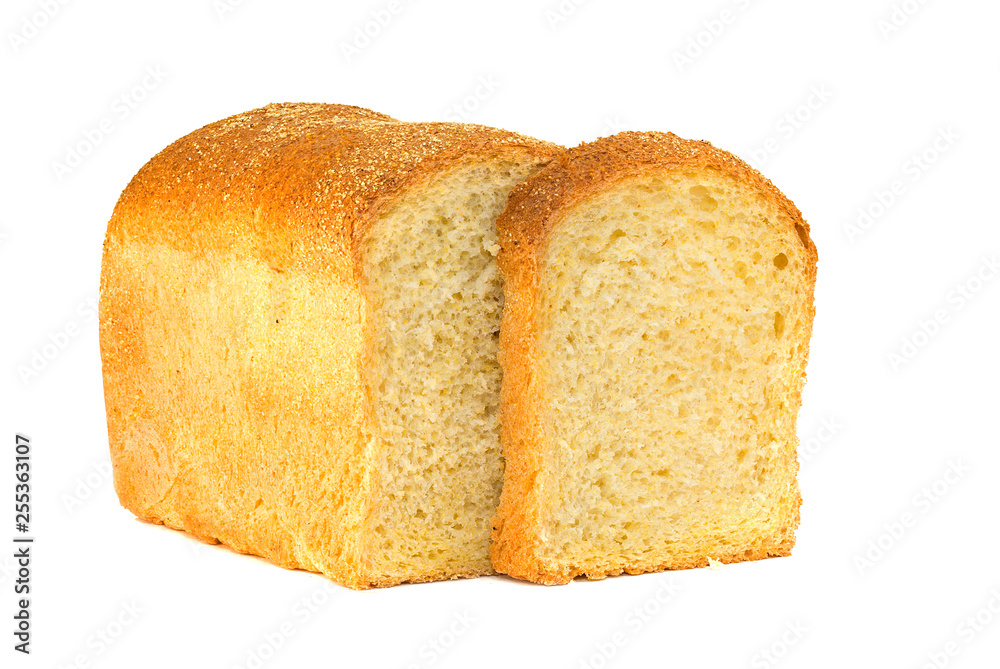 A traditional square loaf of bread is isolated on a white background. bread isolated on a white background. square loaf of bread with two pieces cut off on a white background. A traditional square loaf of bread is isolated on a white background. bread isolated on a white background. square loaf of bread with two pieces cut off on a white background.