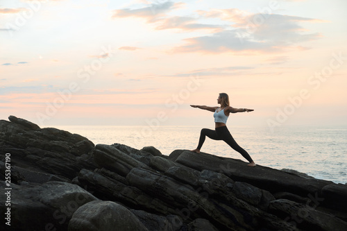 Woman Practicing Yoga in the Nature. Meditating Outdoors