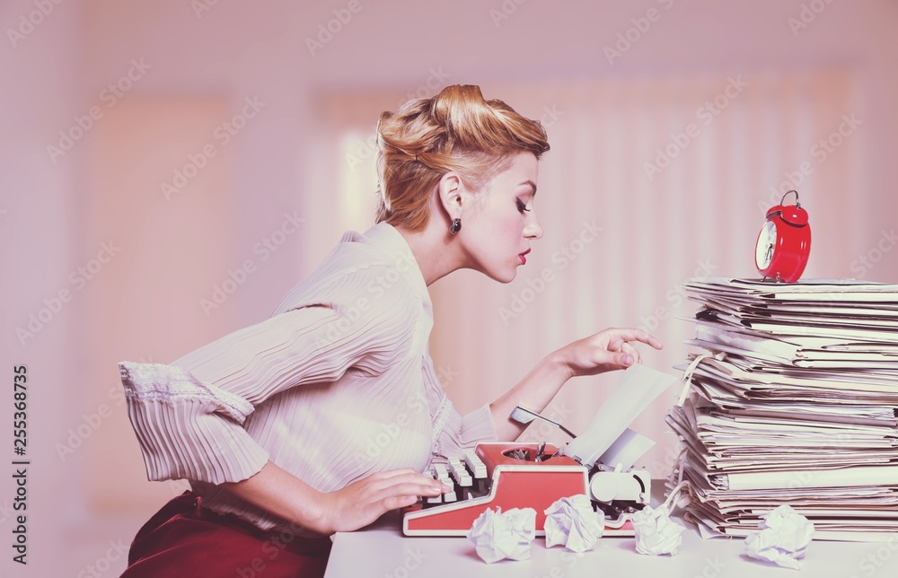 Attractive young woman speaking on  vintage phone - obrazy, fototapety, plakaty 