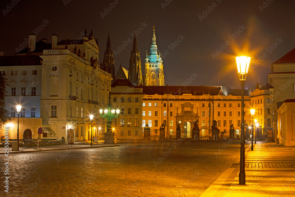 Prague - The Hradcanske square, Castle and St. Vitus cathedral at night.