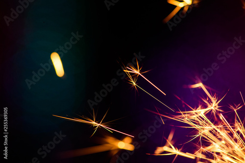 Sparks in the dark. Sparks. Christmas and New Year time. Magic light