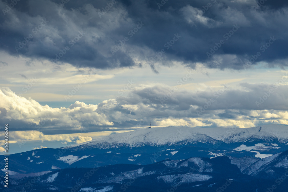 View of the dramatic landscape with snowy mountains. The Kralova Hola, peak in Low Tatras National Park, Slovakia, Europe.