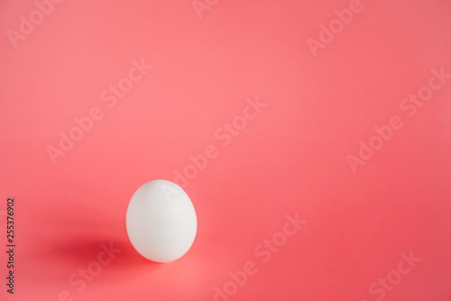 red golf ball on white background