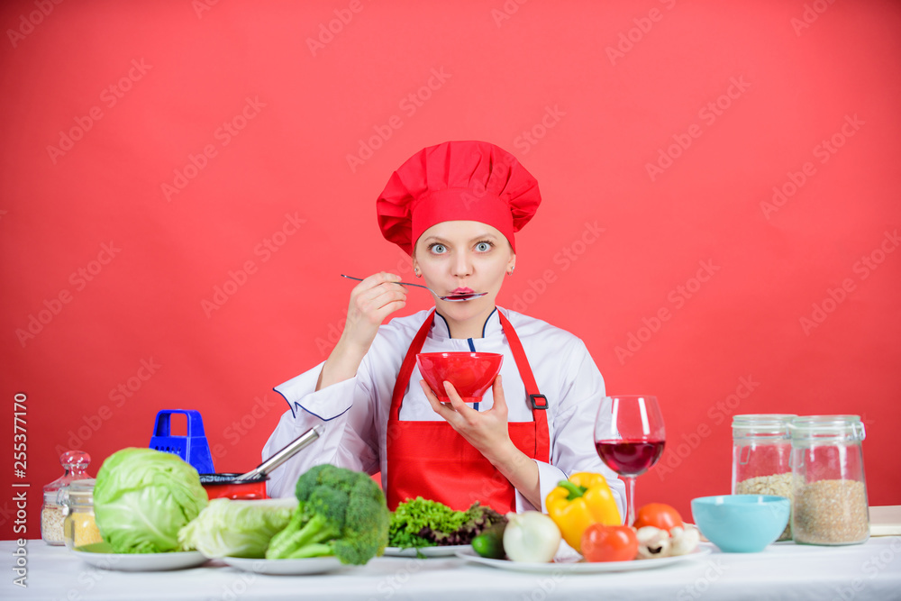 Free healthy vegetarian and vegan recipes. Healthy raw food. Dieting concept. Eat healthy. Girl wear hat and apron try meal taste. Healthy ration. Woman professional chef hold bowl and spoon Free healthy vegetarian and vegan recipes. Healthy raw food. Dieting concept. Eat healthy. Girl wear hat and apron try meal taste. Healthy ration. Woman professional chef hold bowl and spoon