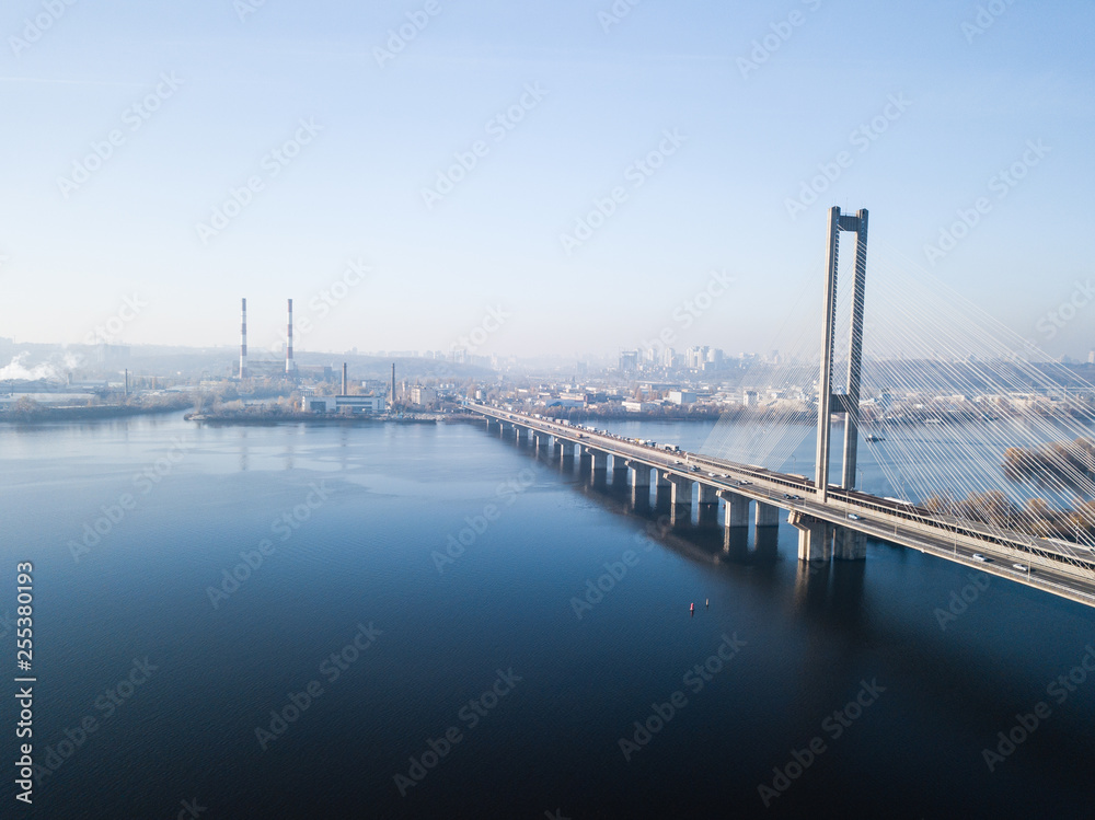 Aerial of the south bridge, city Kyiv Ukraine. South Bridge city of Kiev. The river of the Dnieper, the bridge crosses the river. City landscape from a bird's eye view bridge on river