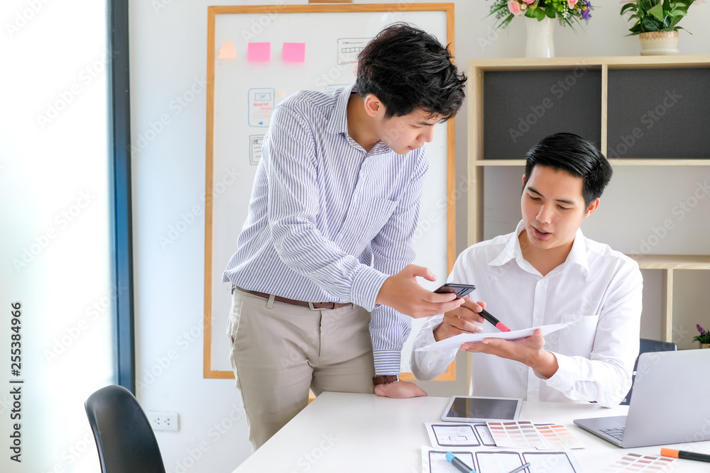 Fototapeta premium Young man designers planning work together on website ux app development.