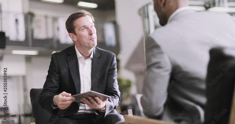 Business colleagues in a corporate office meeting