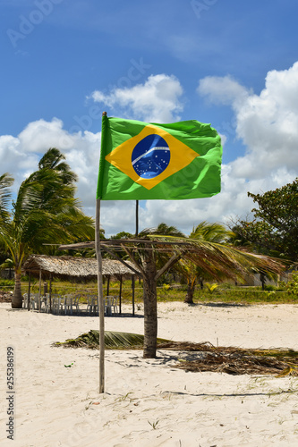 Ilha de Itamaraca, Brazil - Circa January 2019: Brazilian flag at a beach bar