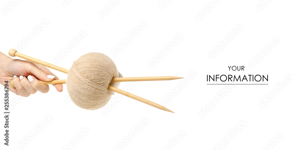 Knitting yarn needles in hand pattern isolated on white background Knitting yarn needles in hand pattern isolated on white background
