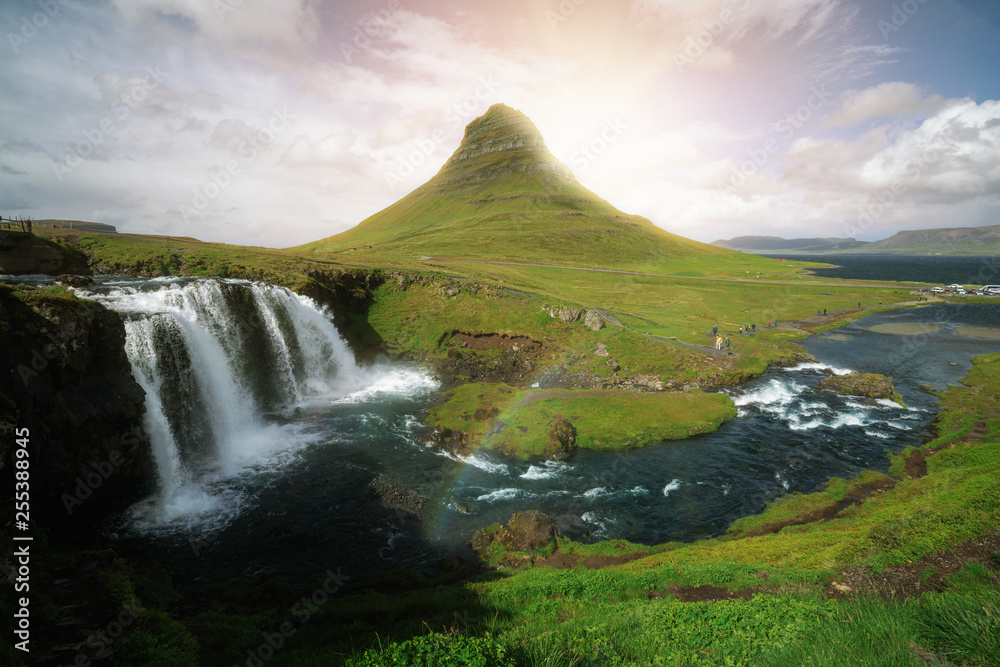 Breathtaking sunrise over Kirkjufell mountain landscape and waterfall ...