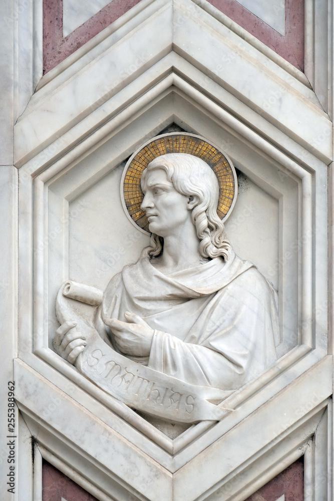 Saint Matthias, relief on the facade of Basilica of Santa Croce (Basilica of the Holy Cross) - famous Franciscan church in Florence, Italy