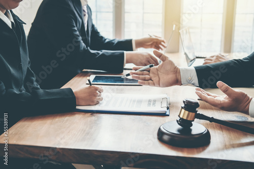 Businessman and lawyer discuss the contract document. Treaty of the law. Sign a contract business. photo