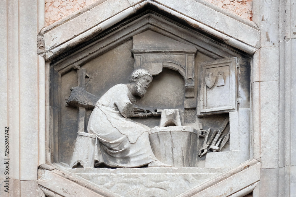 Tubalcain by Nino Pisano, 1334-36., Relief on Giotto Campanile of Cattedrale di Santa Maria del Fiore (Cathedral of Saint Mary of the Flower), Florence, Italy